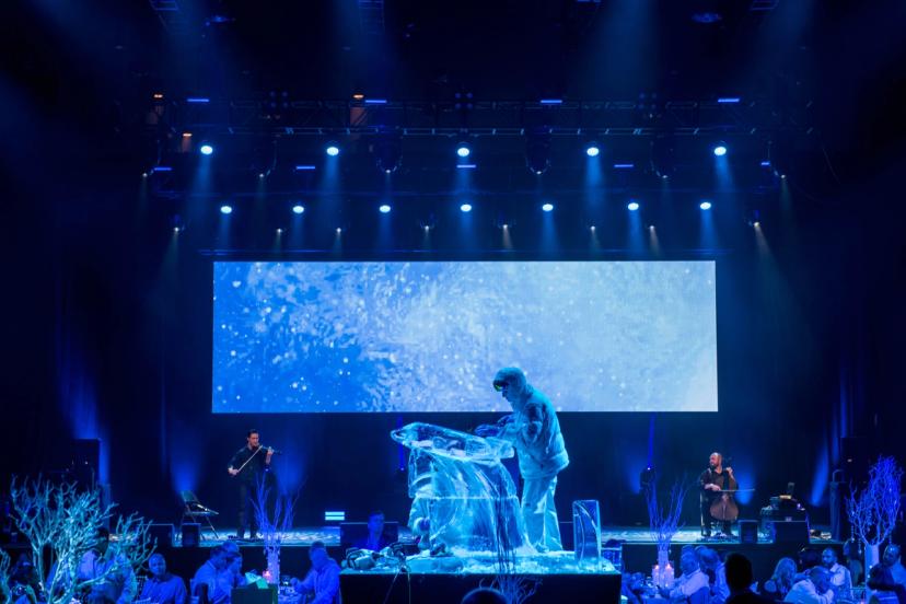 Ice Sculpture and string duo performing at a corporate event.