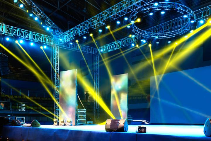 Live event production Atlanta: Stage setup with lighting production for a corporate event.