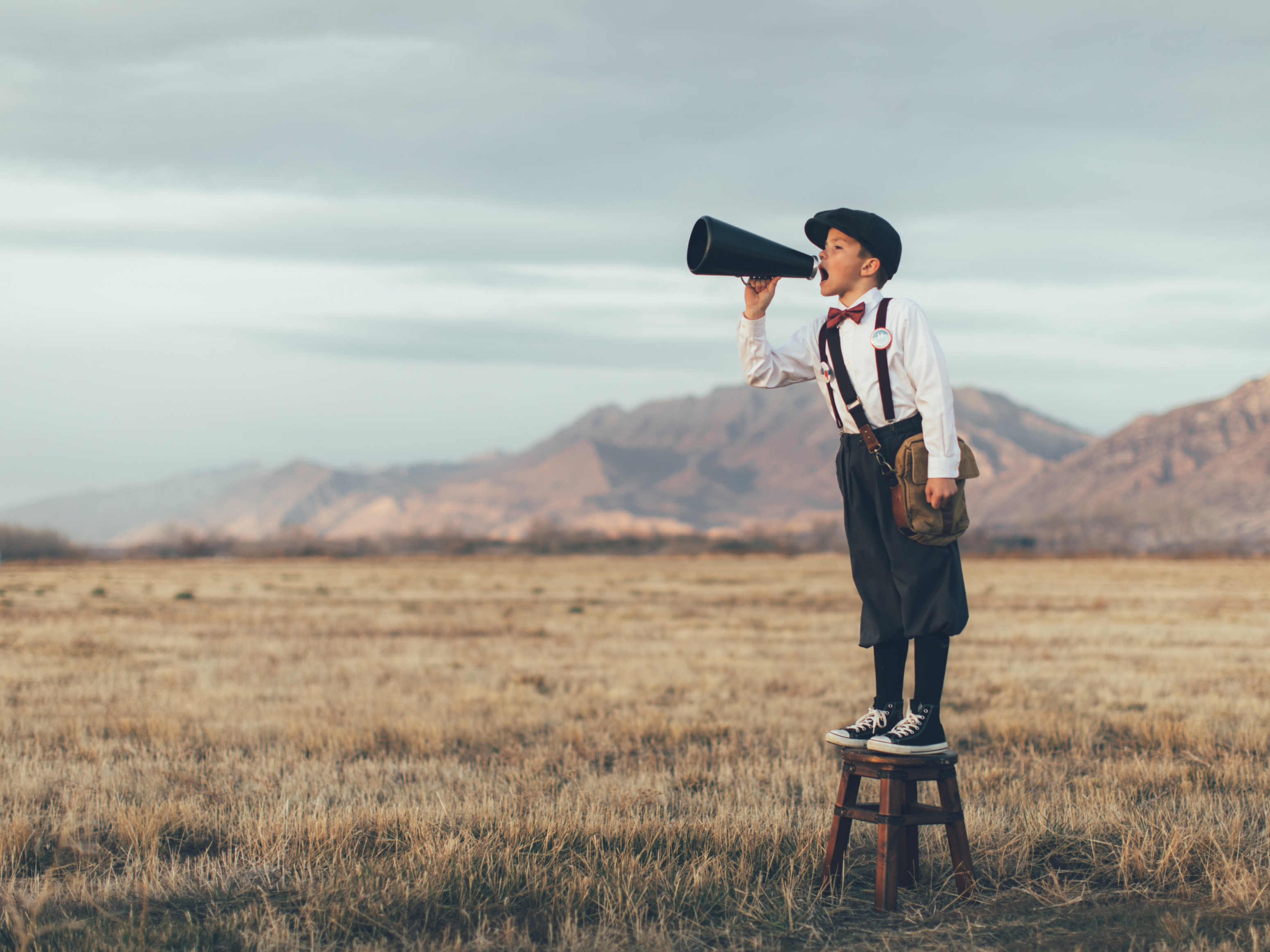 Picture of kid blowing a trumpet