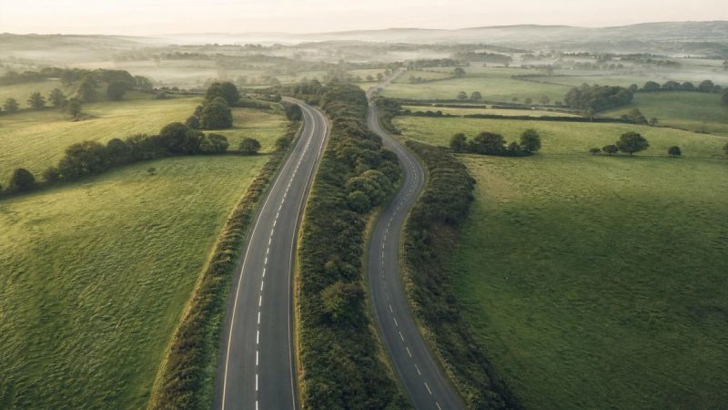 Two parallel roads, one busy public motorway and one quieter private lane, symbolising public versus private ADHD assessment routes in Ireland.