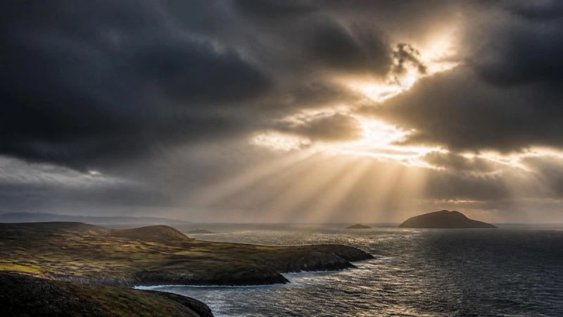 A stormy Irish sky with light breaking through, representing mood swings and irritability