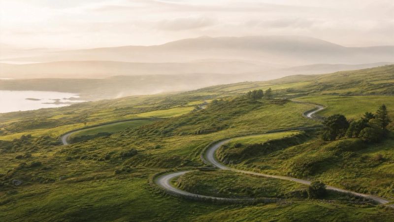 Abstract looping paths in a peaceful Irish landscape, symbolising the OCD cycle of obsessions and compulsions