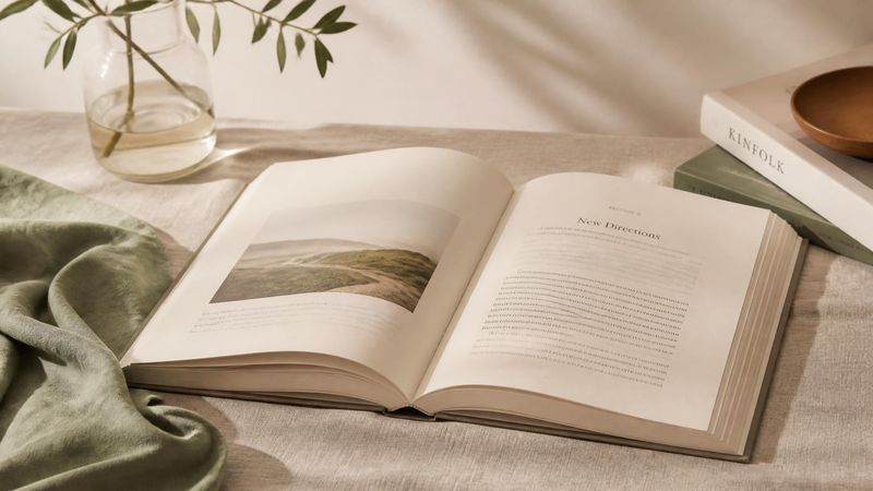 An open book on a linen surface, representing frequently asked questions about therapy for menopause