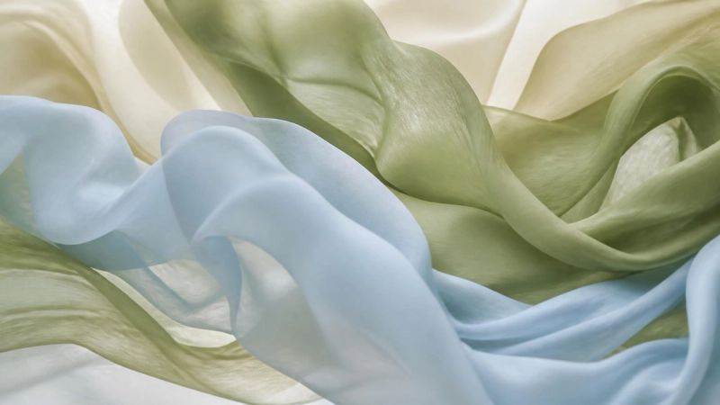 Abstract flowing fabric in motion, representing hormonal changes affecting emotions during menopause