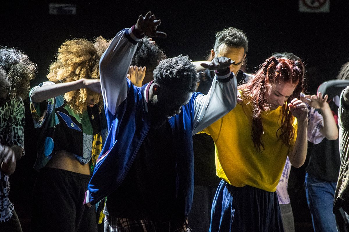 The picture shows dancers of the performance during the play.