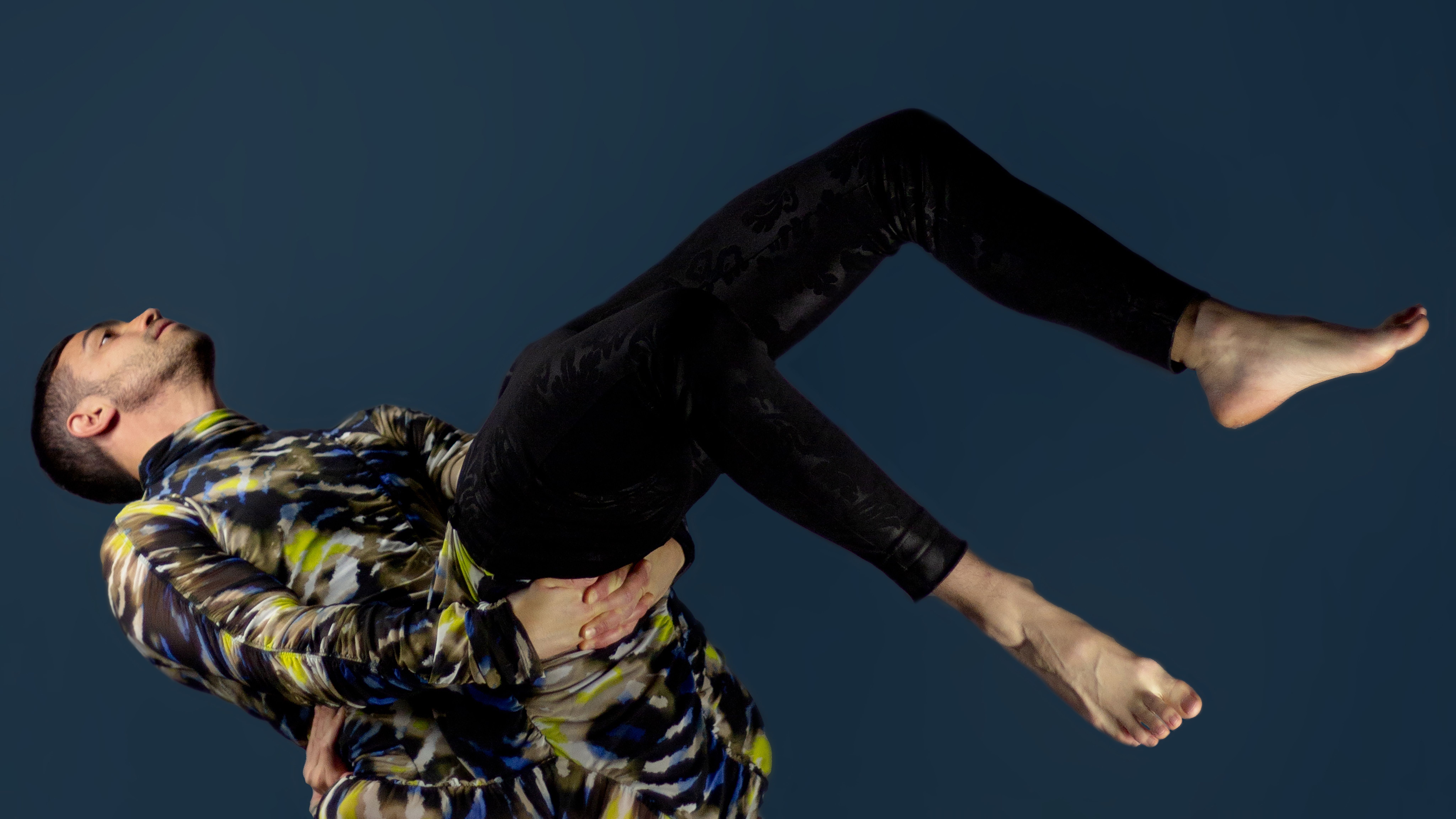 Two people whose bodies merge into one another