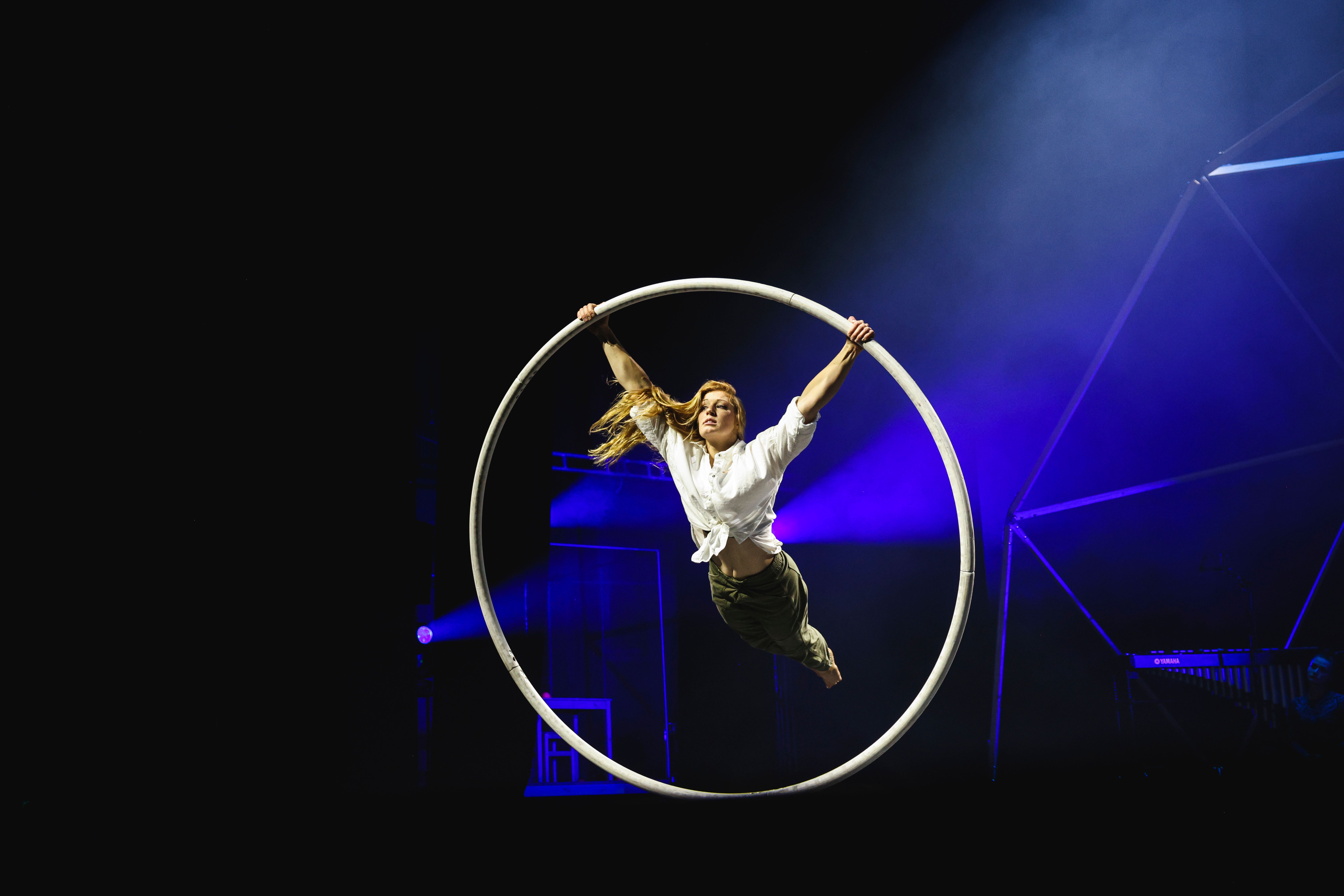 You can see an acrobat with a Cyr wheel.