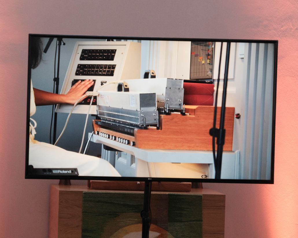 A monitor showing electronic musical instruments and equipment.