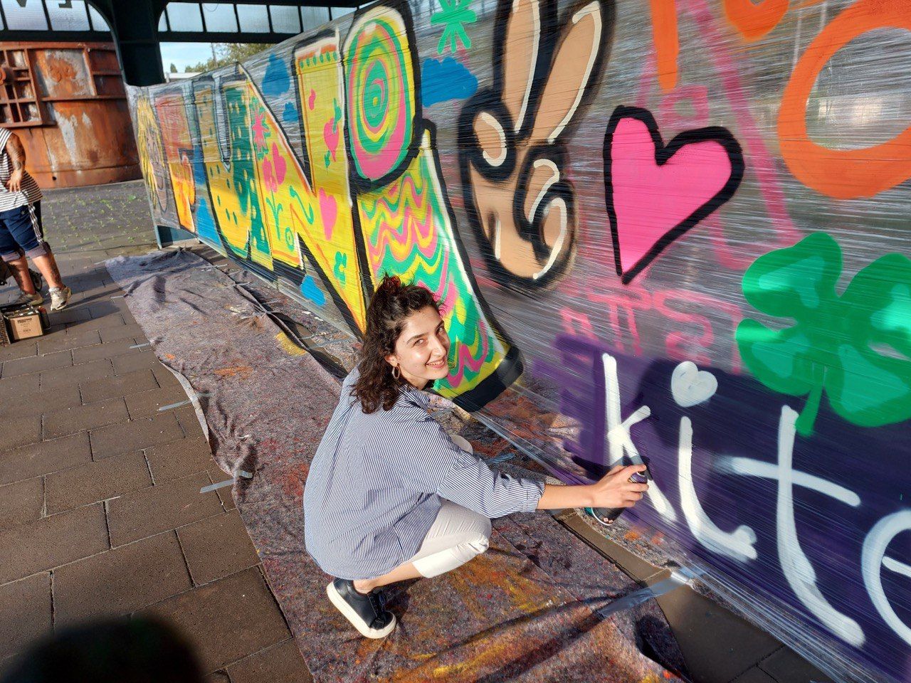 Woman doing graffiti