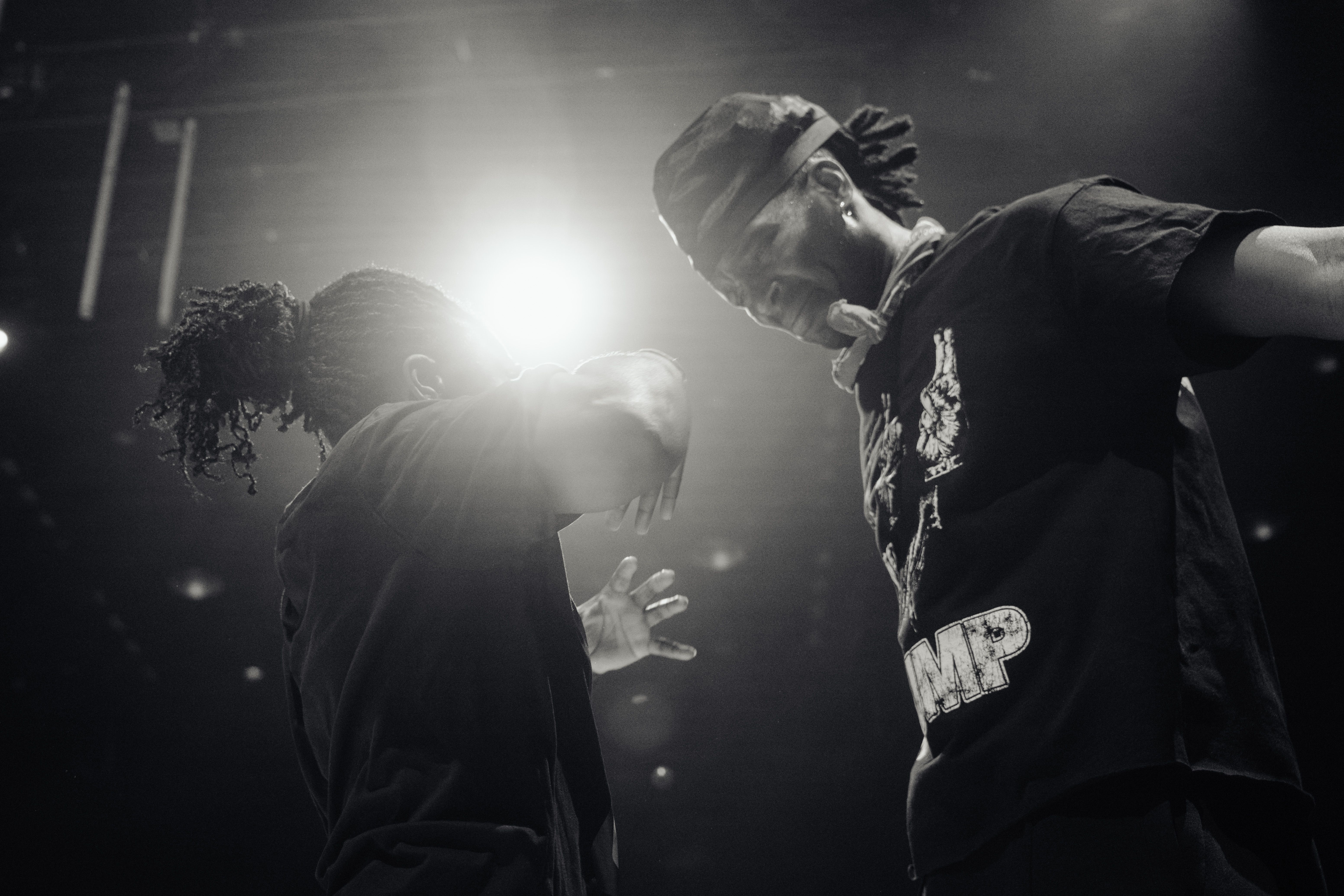 two dancers dancing togethe