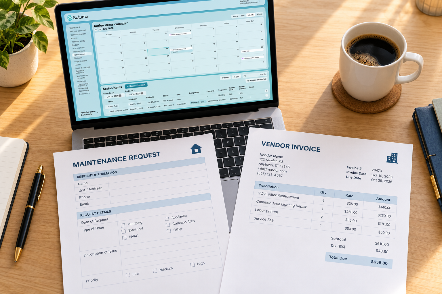 Overhead view of an organized desk with a laptop displaying a maintenance dashboard, a printed maintenance request form, a vendor invoice, and a coffee mug on a light wood surface.
