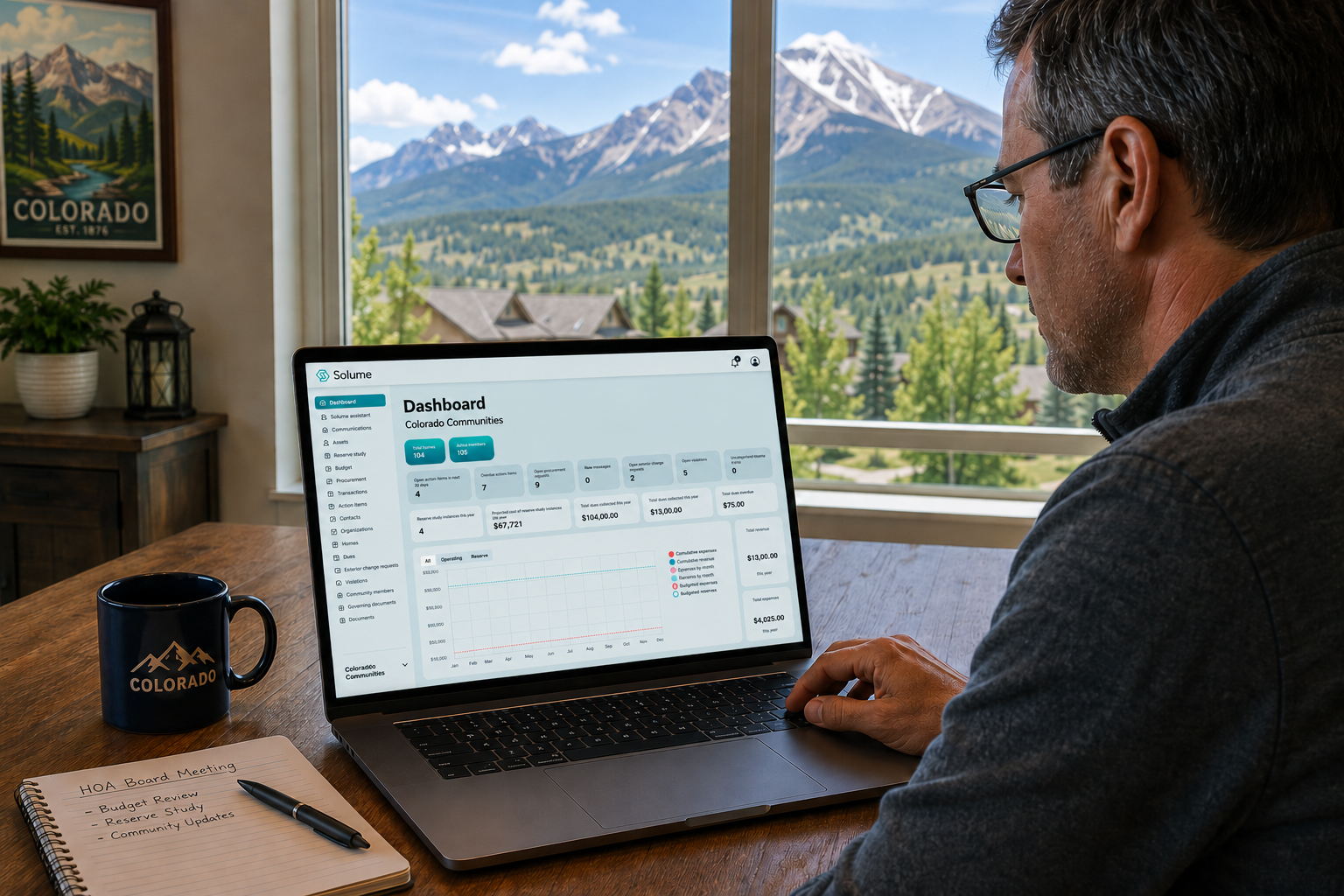 Volunteer HOA board member reviewing the Solume HOA management dashboard on a laptop with Colorado mountain views in the background.