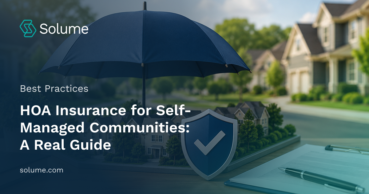 Miniature HOA community protected by a blue umbrella and shield, with insurance documents on a desk