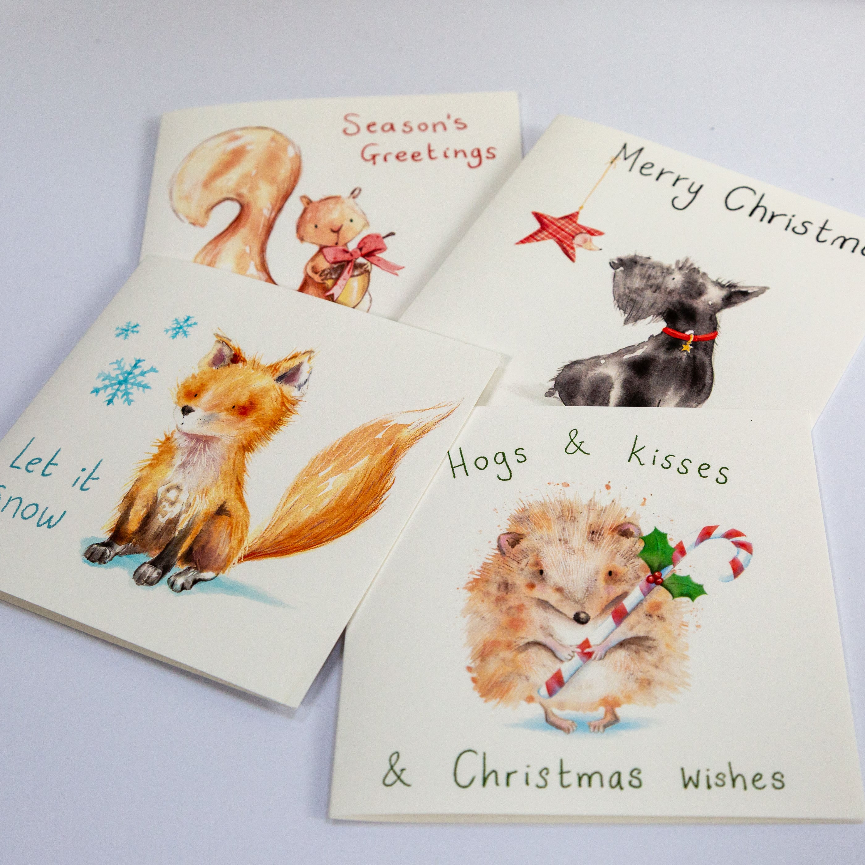 Set of four illustrated woodland animal Christmas cards by Lisa B Draws
