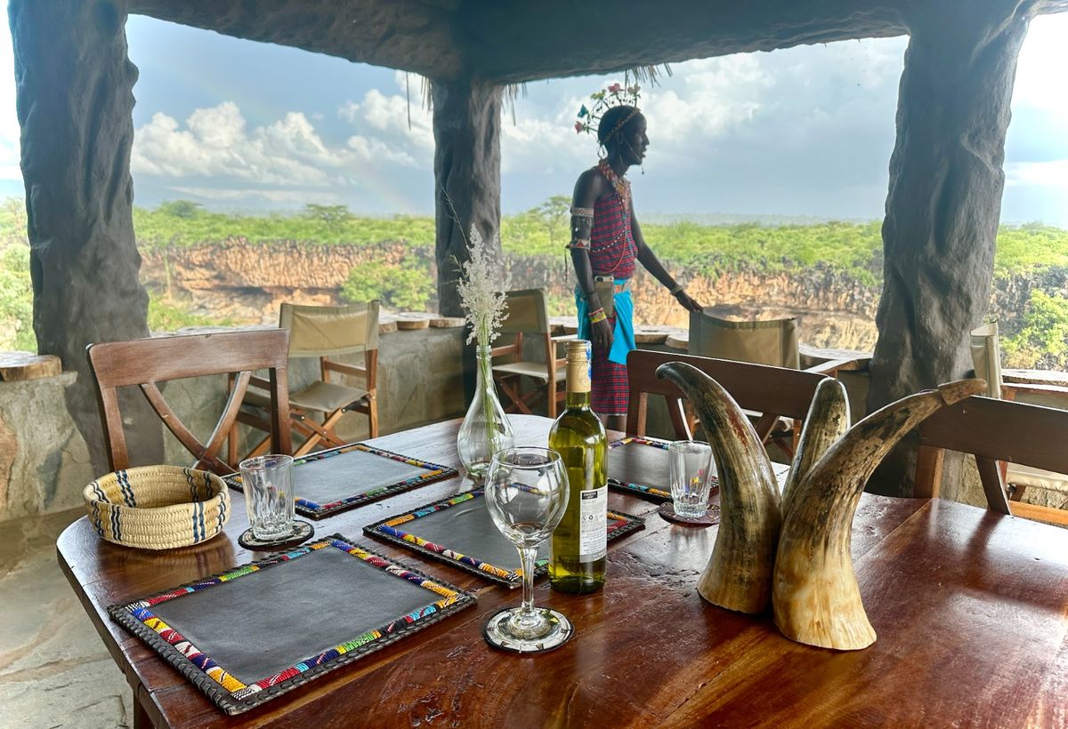 Open-air dining deck with valley view