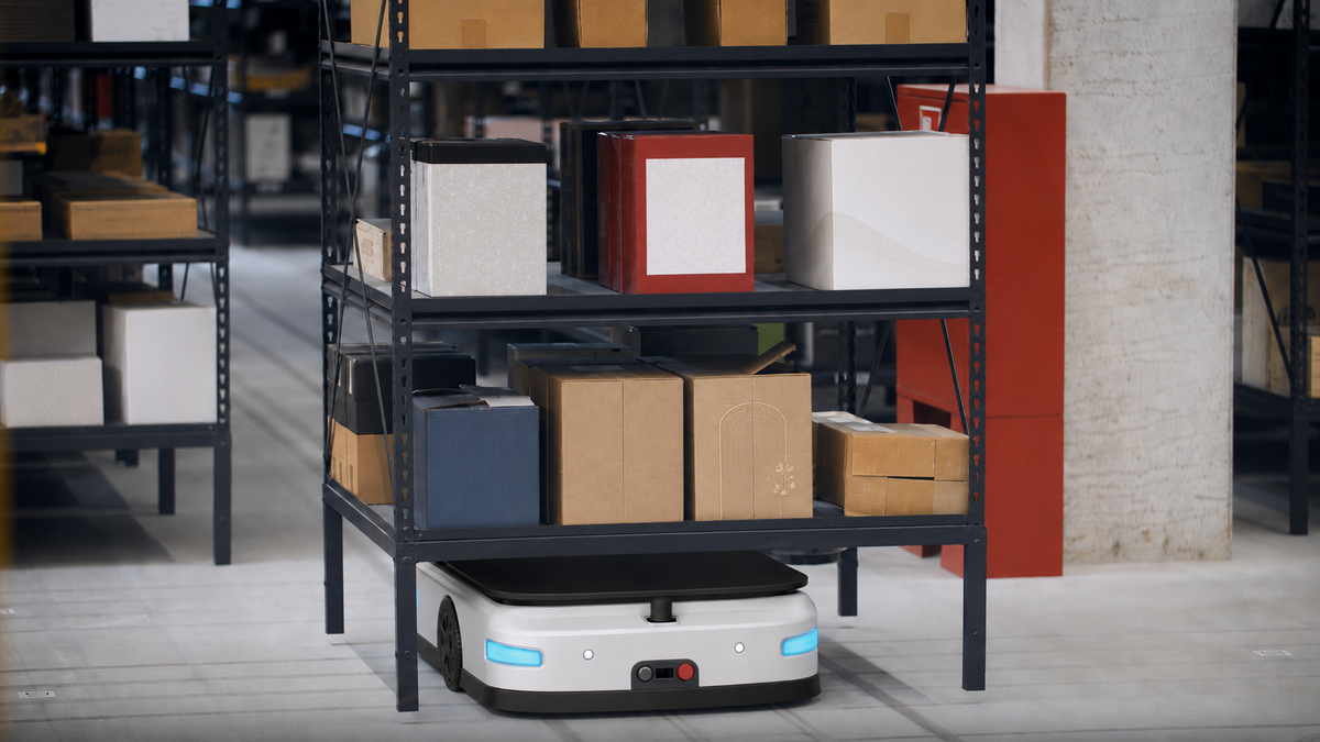 Lifting automated robot moving a storage rack with packaged goods