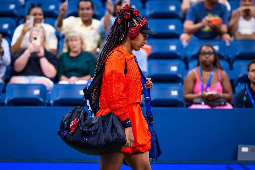 The 2025 US Open, head-to-toe red, crystal embellished Labubu charm named 'Billie Jean Bling' Fashion as institutional memory.
