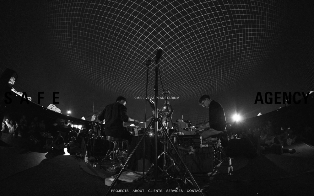 Screenshot of the Safe Agency website showing a project subpage with a large title image showing two drummers on a stage