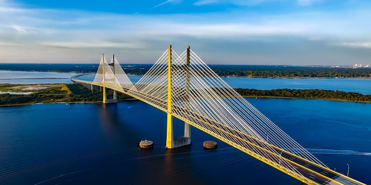 Bridging the Gap: Legacy System Revitalization and Knowledge Transition for Client