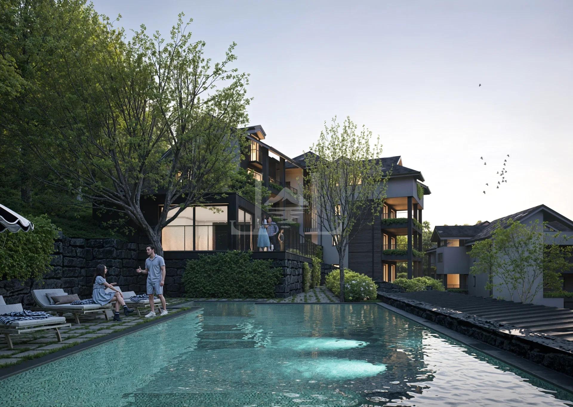 New Construction Apartments for Sale in Meina with Lake Maggiore Views, Swimming Pool and Wellness Area