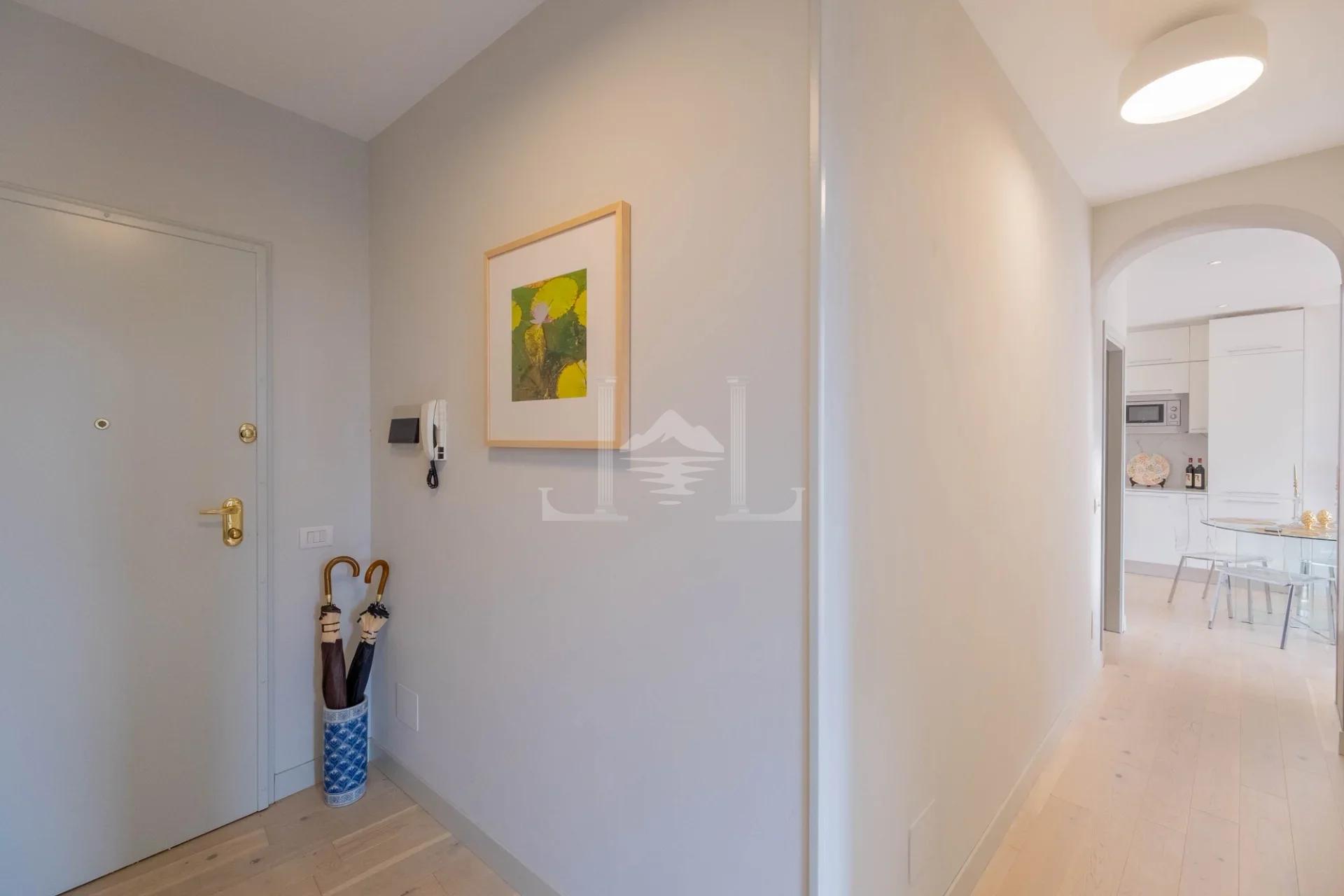 Entrance of the apartment in Via Solferino, Suna