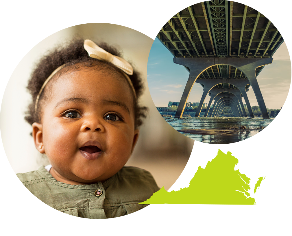Smiling baby girl with a bow in her hair next to photo under a large bridge in Virginia.
