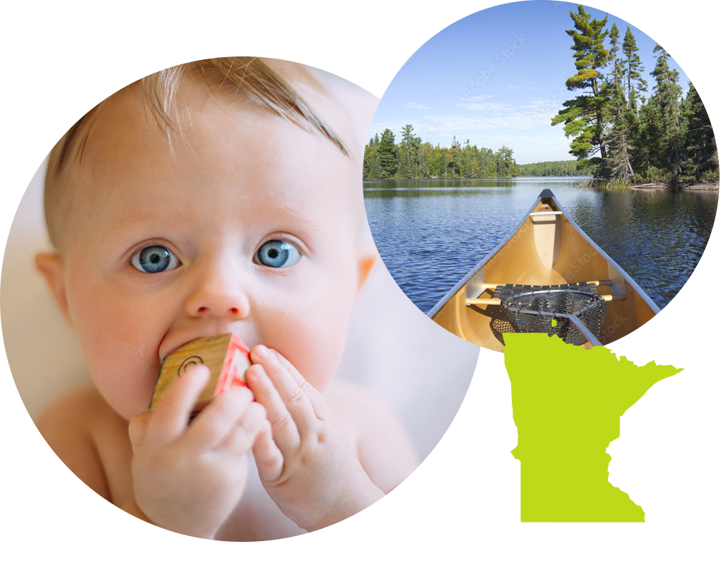 Baby boy with blue eyes sucking on a toy block next to photo of a canoe on a river in Minnesota.