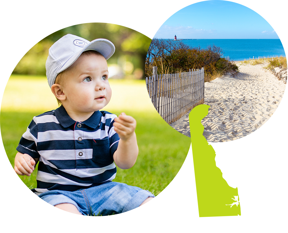 Baby boy in a baseball hat playing next to image of a beach in Delaware.