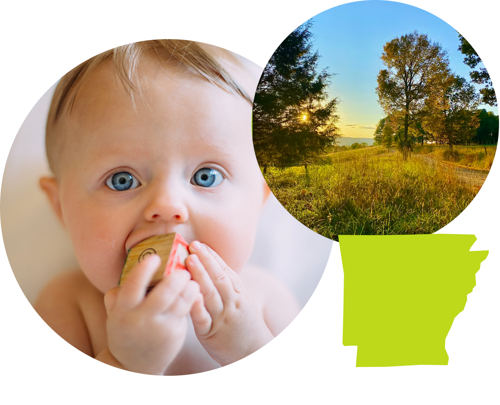 Baby boy with blue eyes sucking on a letter block next to image of a grassy field in Arkansas.