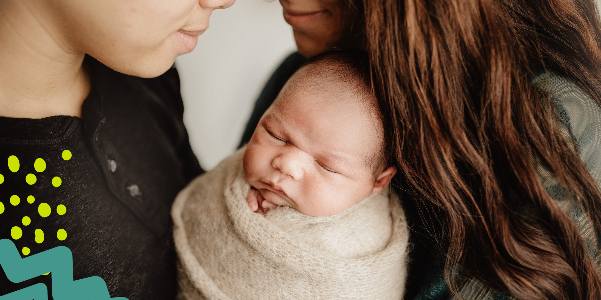 adoptive family with newborn baby