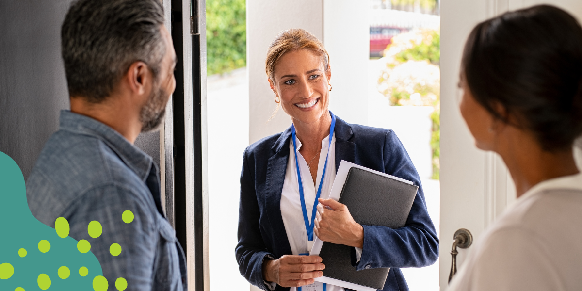 a couple welcomes their home study provider for their adoption home study visit