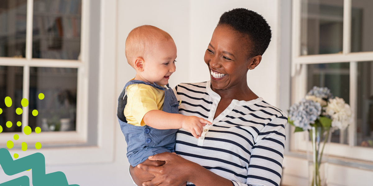 adopted baby at home with his adoptive mother