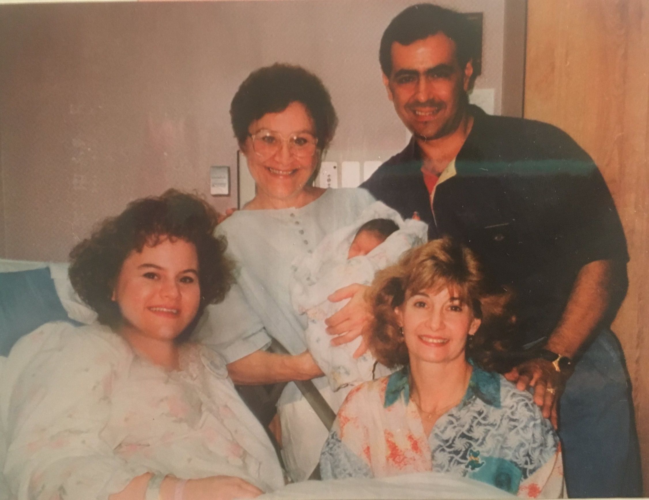 Tori and her family in the hospital after she was born.