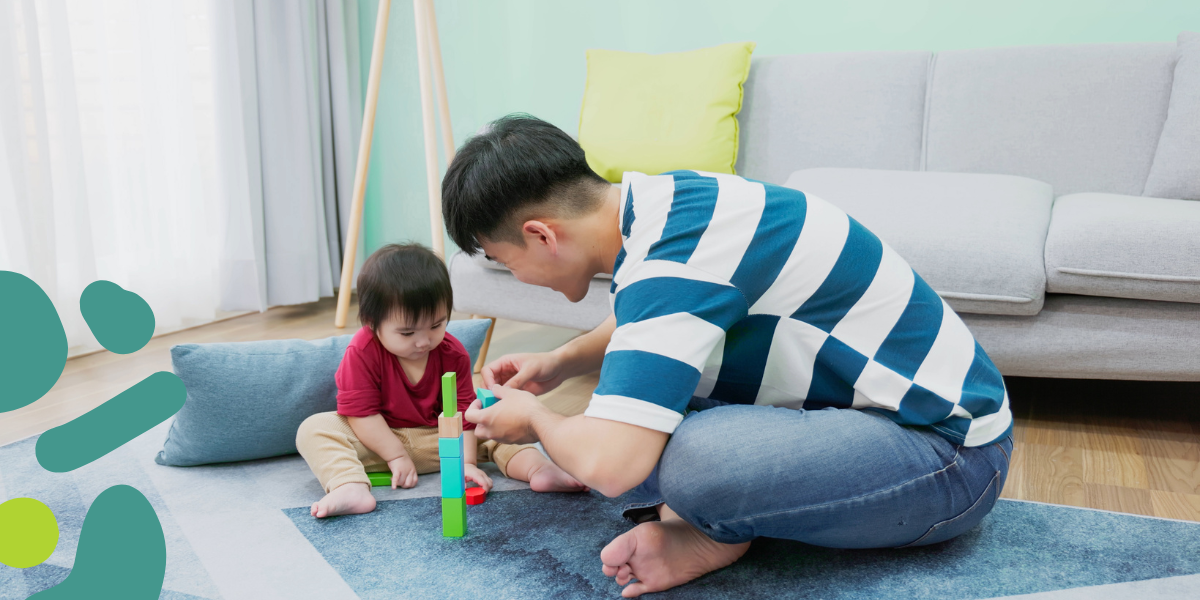 single dad playing with his adopted child