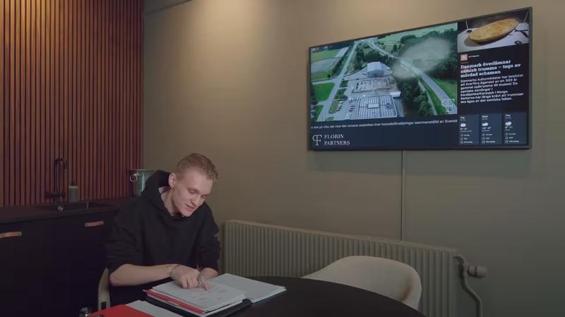 TV screen in real estate meeting room