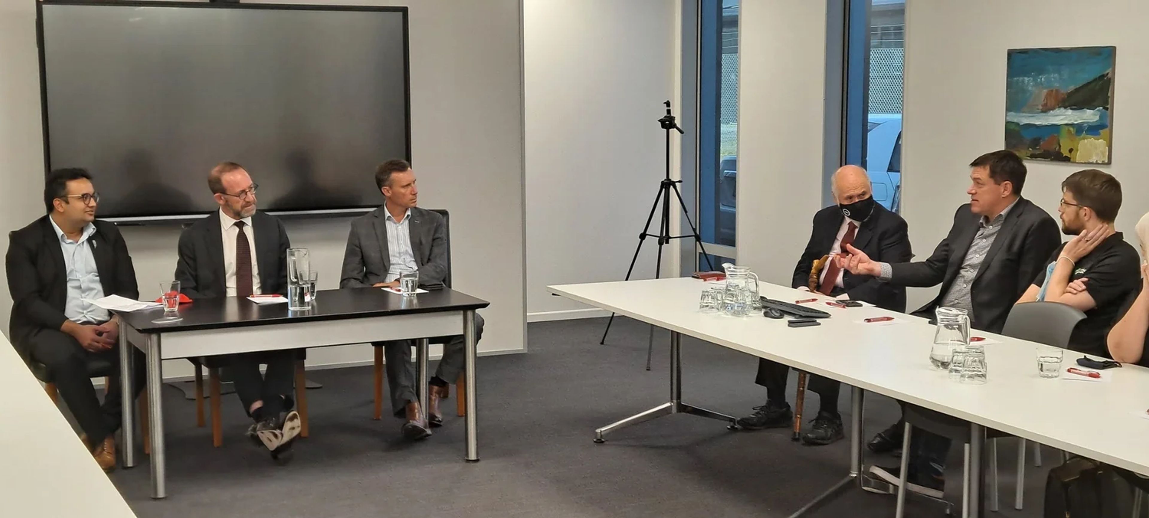 The Honourable Andrew Little (Minister of Health) listens to CBS Chief Executive, Ross Wilson