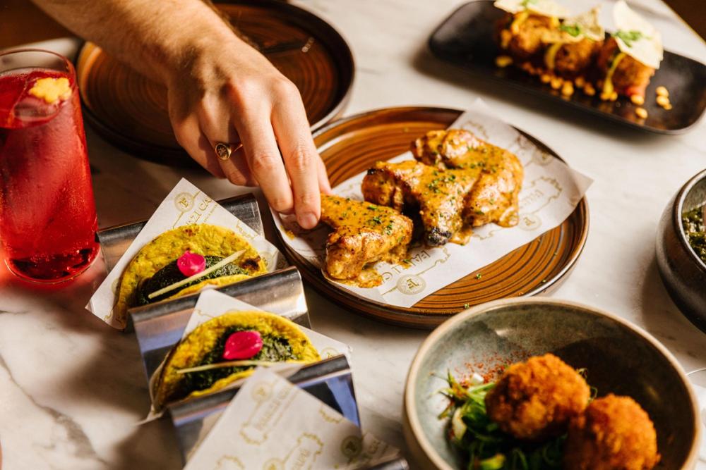 Food arranged on table at Farzi London
