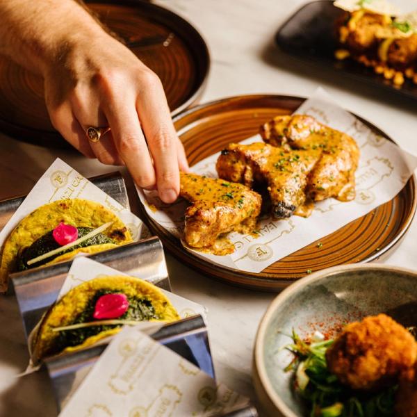 Food arranged on table at Farzi London