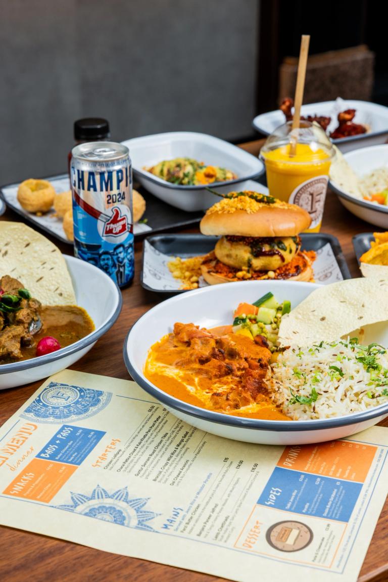 Table of food at Farzi Boxhall location