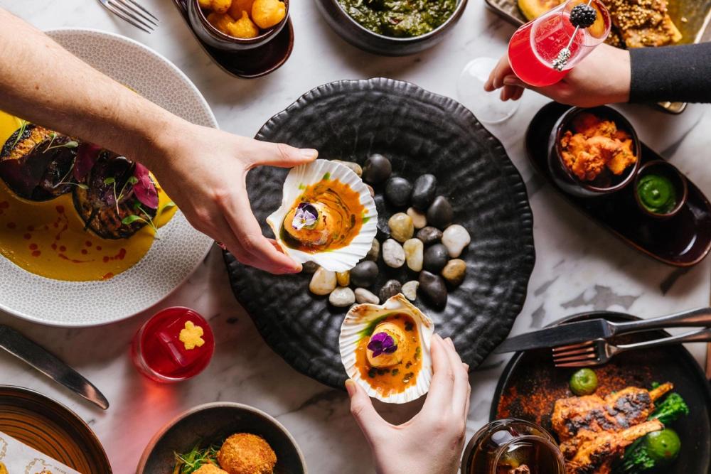 Sharing food at Farzi London