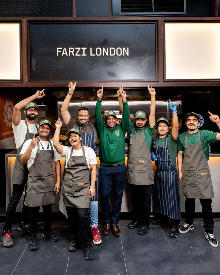 The team standing outside farzi london at boxhall