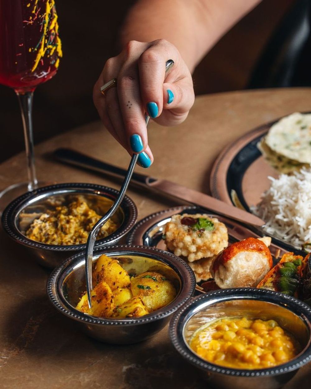 Person eating Farzi London