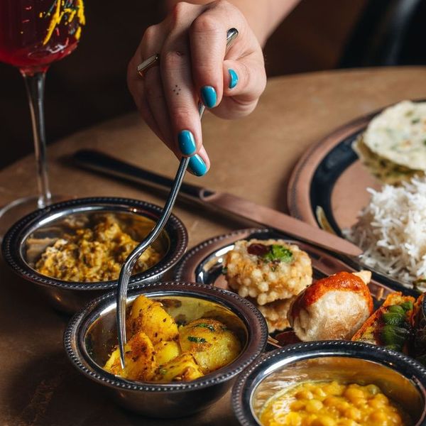 Person eating Farzi London