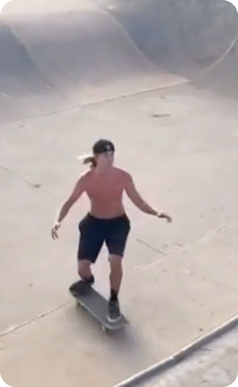 shirtless skater in a skate park