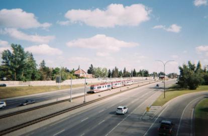 Train next to highway