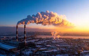 Smoke billowing from industrial facility
