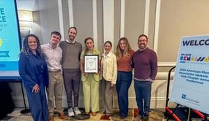 SLR staff receiving award