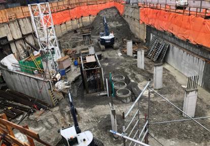 Excavation pit with construction equipment