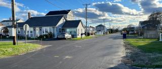 Meadow Pond neighborhood in Hampton, New Hampshire showing drainage on street
