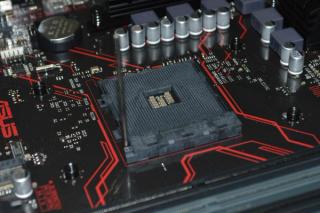Red and black computer motherboard